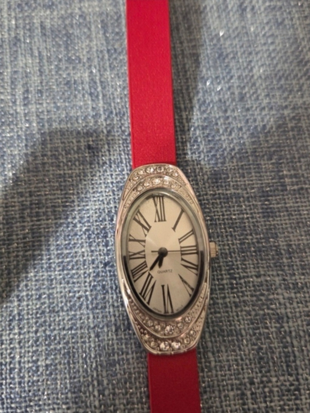 Red Strap Silver Crystal Oval Face Watch